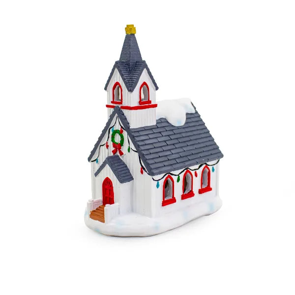 Decorative Christmas church ornament with a steeple on a white background
