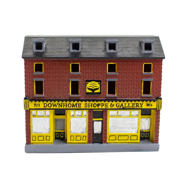 Model-of-a-two-story-building-with- a-sign-reading- 'Downhome Shoppe & Gallery'-on-a-white-background