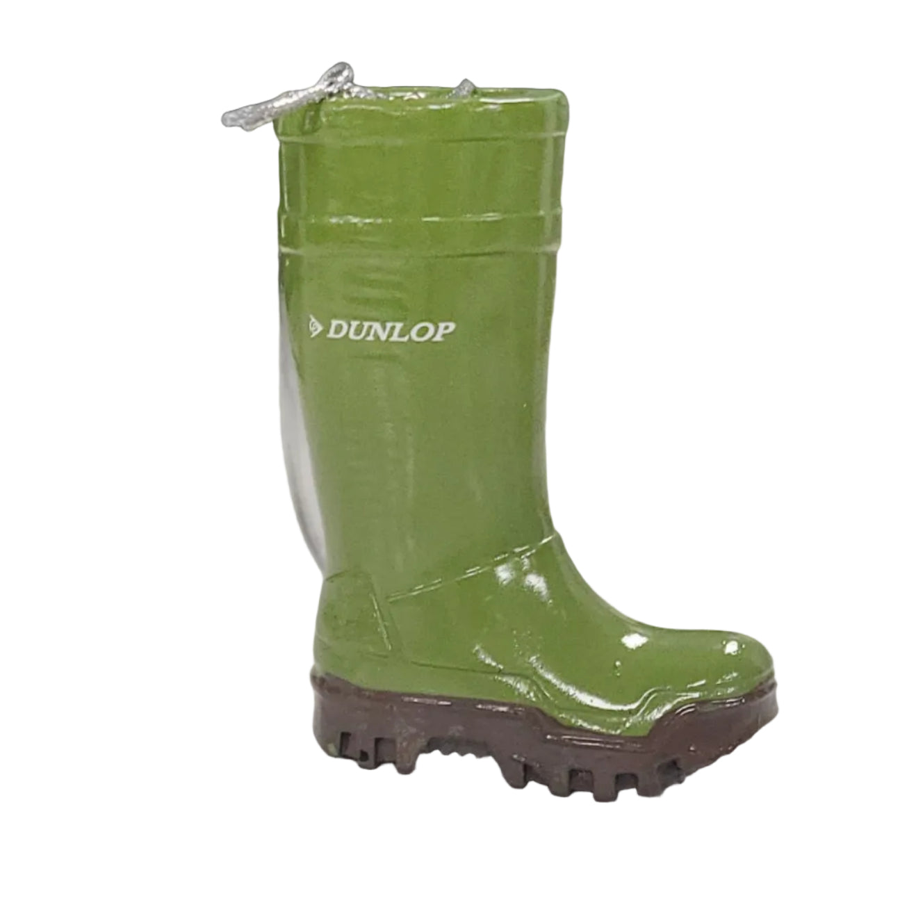 Green Dunlop rain boot on a textured surface with a blurred background