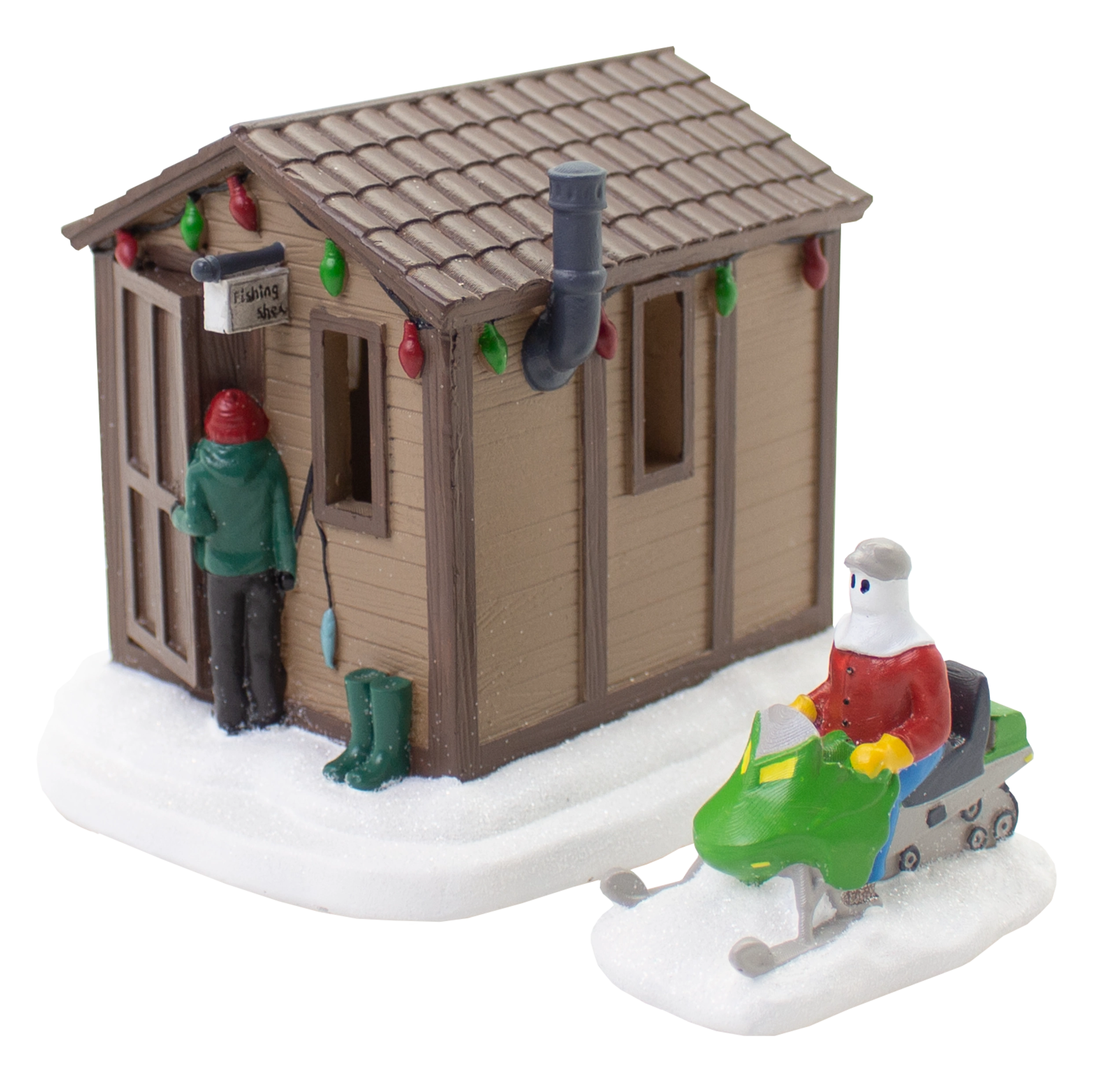 Christmas village figurine of two mummers at a fishing shed, one on a snowmobile and one standing by the door.