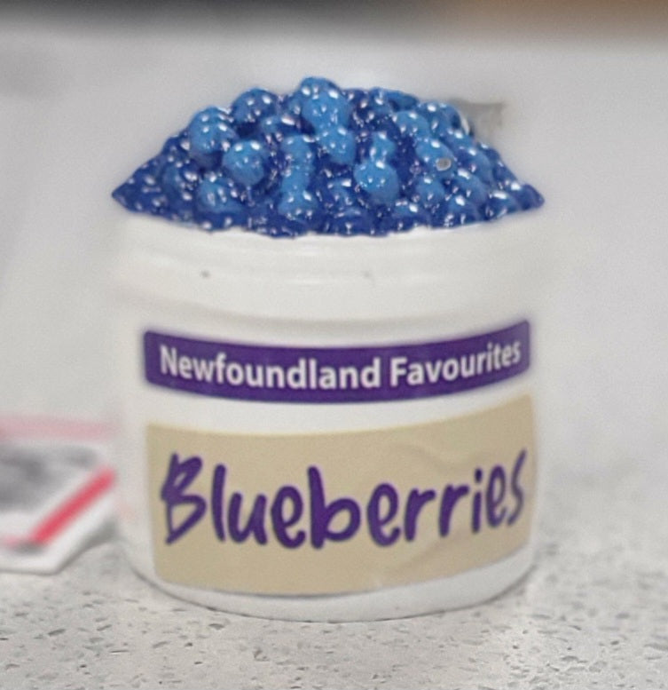 Newfoundland ornamet featuring blueberrys on a grey background