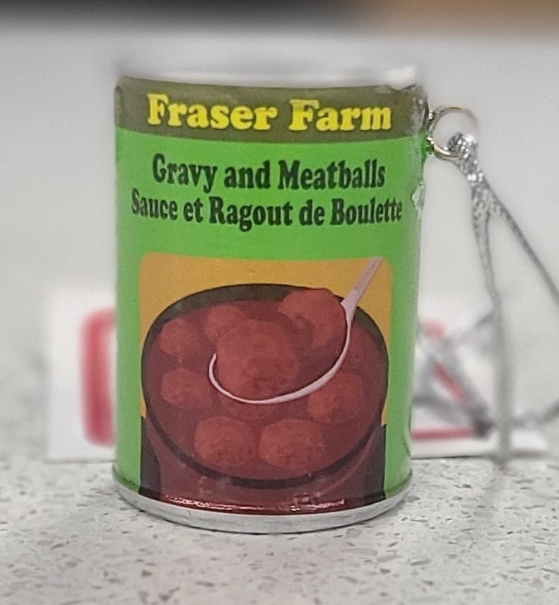 Miniature can of Fraser Farm Gravy and Meatballs on a neutral background