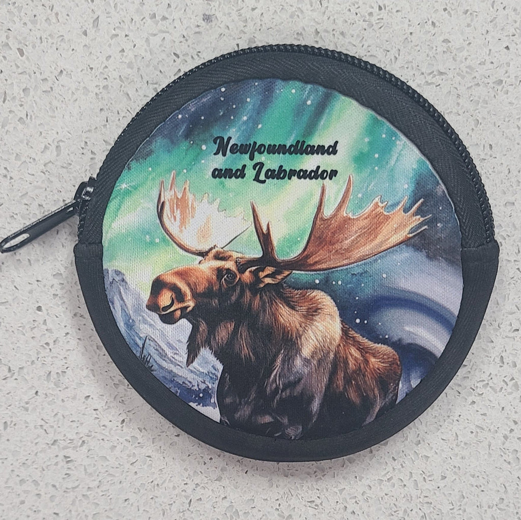 Round purse with a moose design and 'Newfoundland and Labrador' text on a textured surface