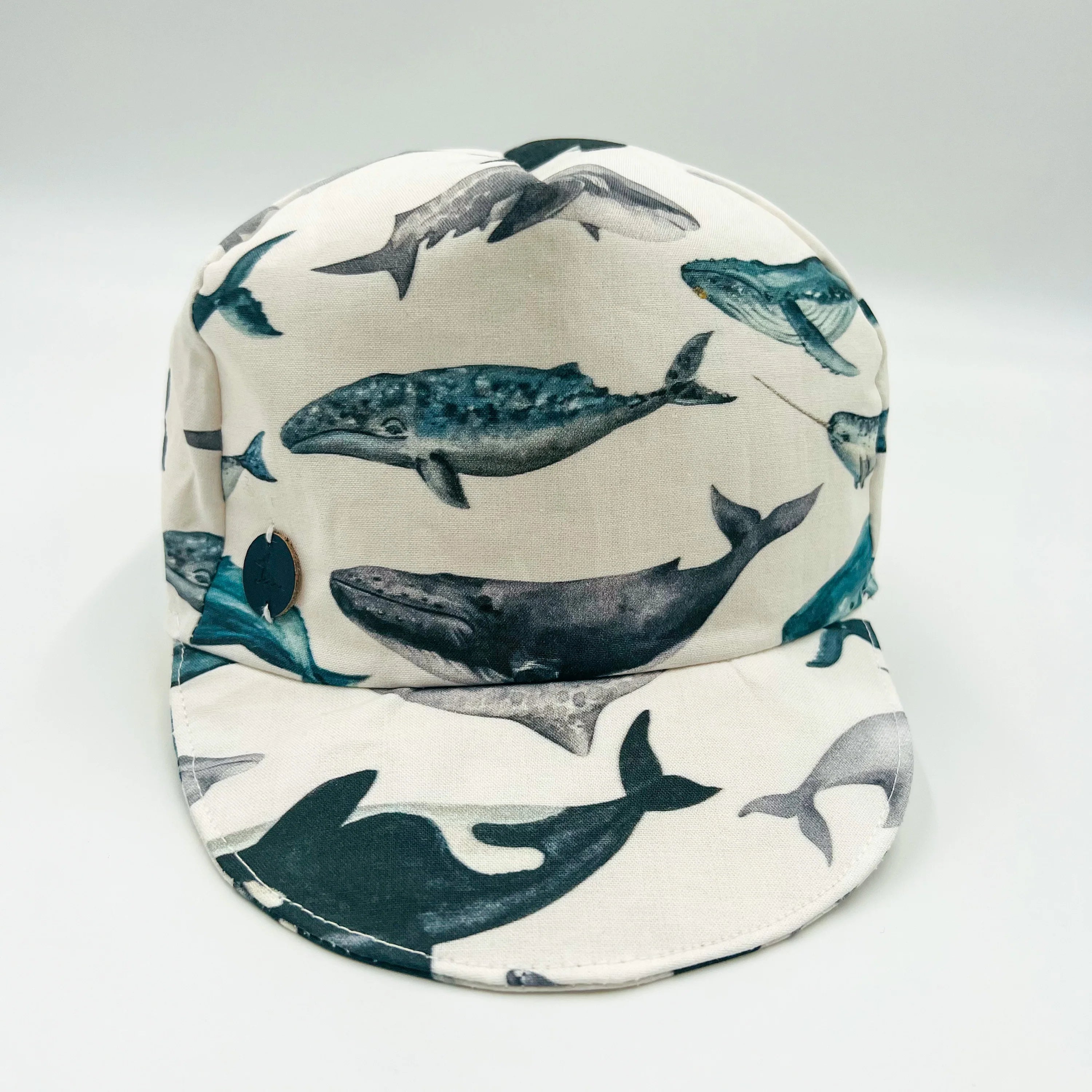 Toddler Whale Baseball Cap with famous Newfoundland whales, front view.