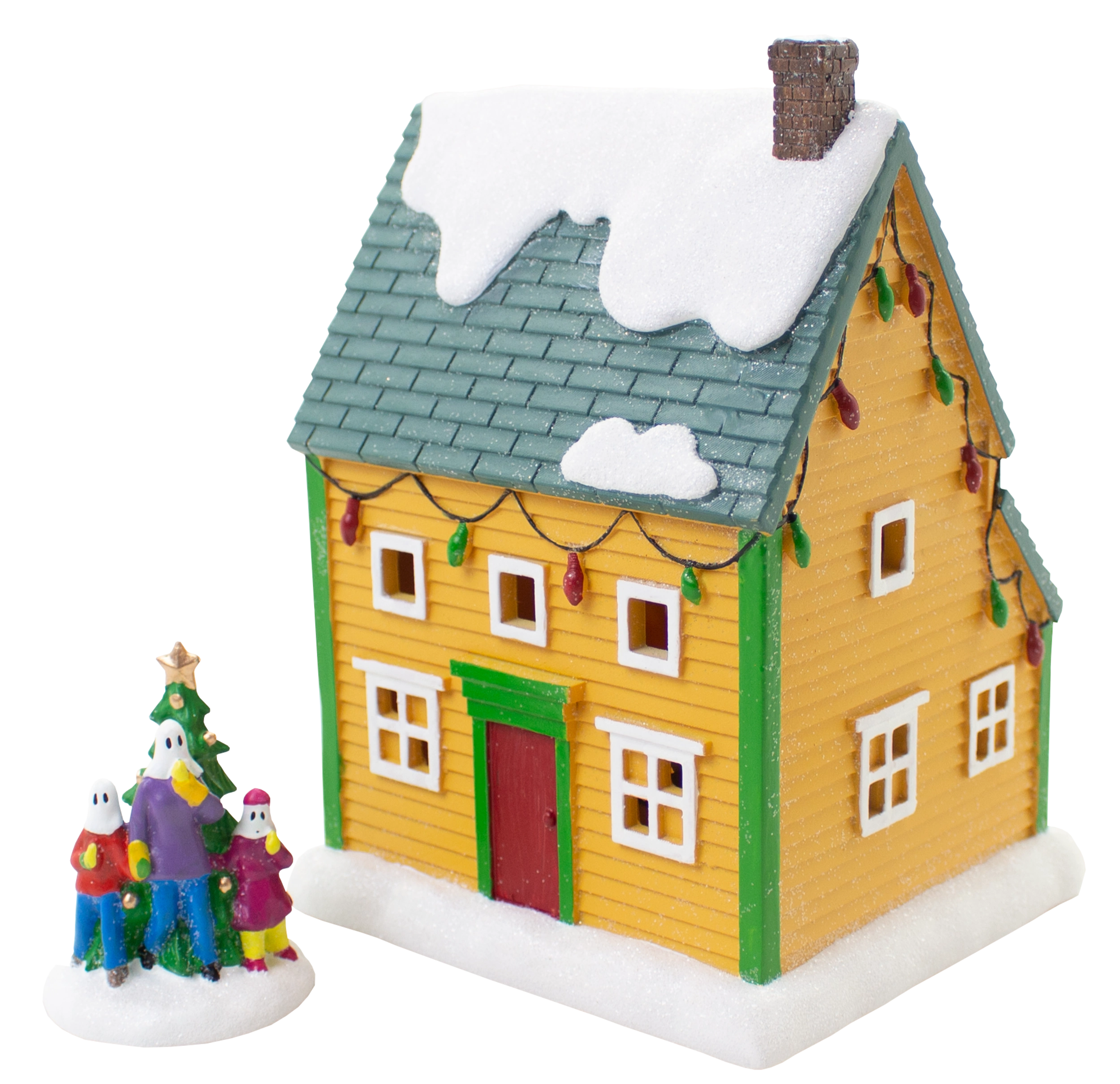 Newfoundland saltbox house Christmas village décor in yellow with snowy roof, festive lights, and mummers by a tree.